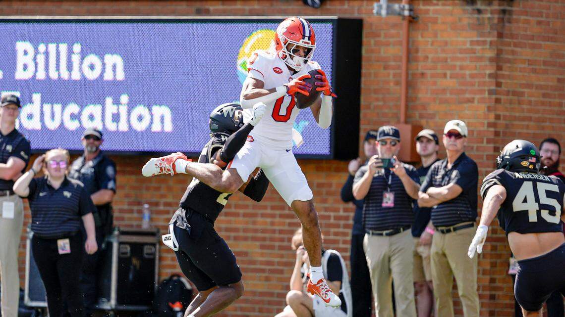 Clemson Tigers wide receiver Antonio Williams (0) makes a scoring catch against Wake Forest Demon Deacons defensive back Jamare Glasker during the first half at Allegacy Federal Credit Union Stadium on Saturday, Oct. 12, 2024.