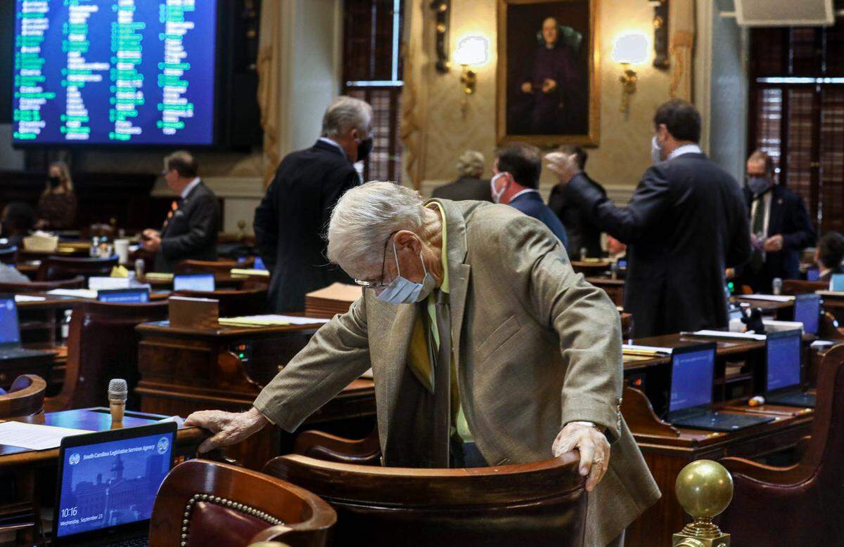 SC Rep. Jimmy Bales, D-Richland, settles into his seat for his last day at the SC House. Bales is leaving after serving 22 years.
