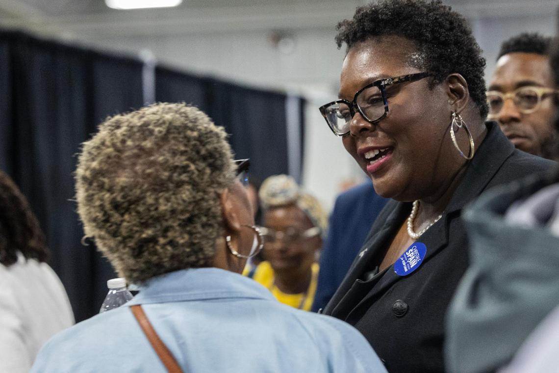 Christale Spain speaks with delegates before the South Carolina Democratic Party convention on Saturday, April 29, 2023.