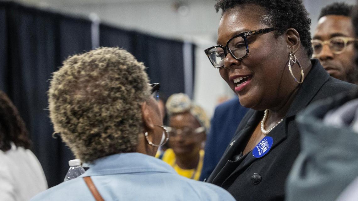 Christale Spain speaks with delegates before the South Carolina Democratic Party convention on Saturday, April 29, 2023.