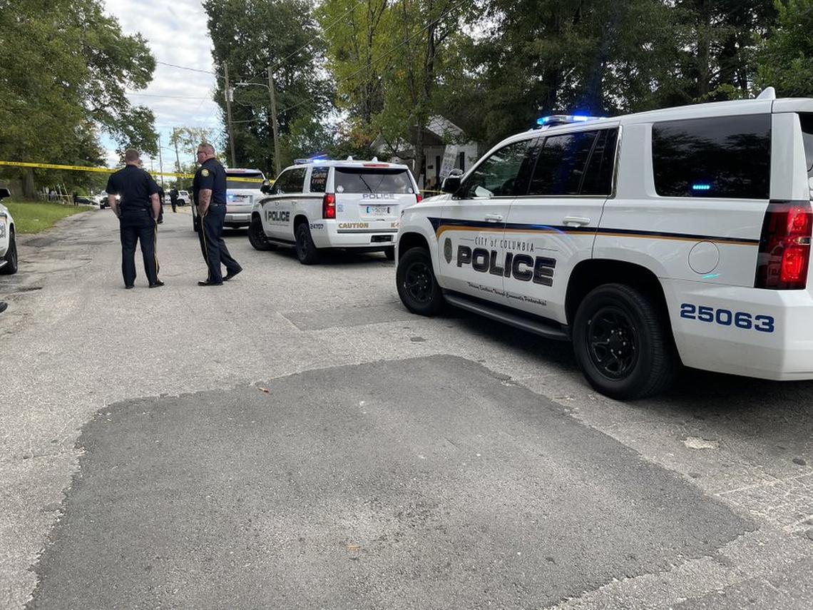 Columbia police officers investigate a shooting.
