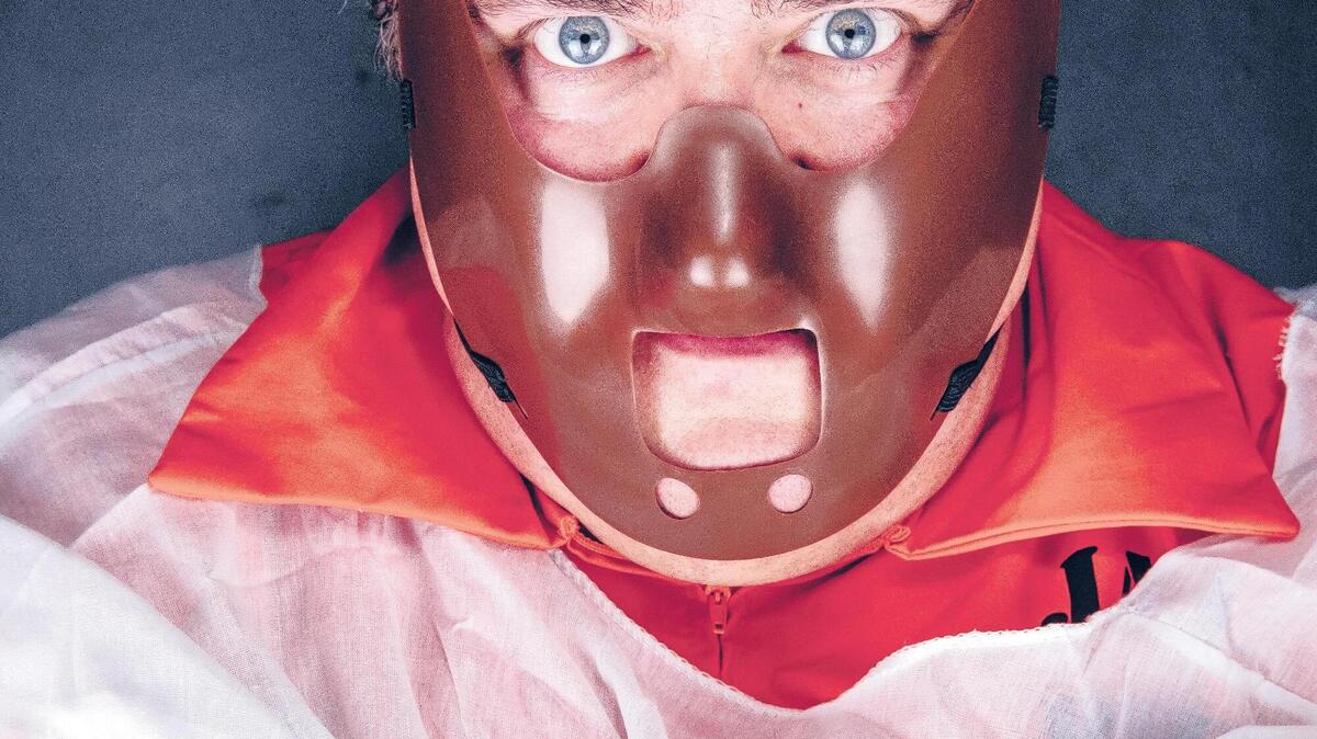 Don’t be fooled: this cannibal is also an avid dancer. Hunter Boyle stars as Dr. Hannibal Lecter in Trustus Theatre’s production of “Silence! The Musical.”