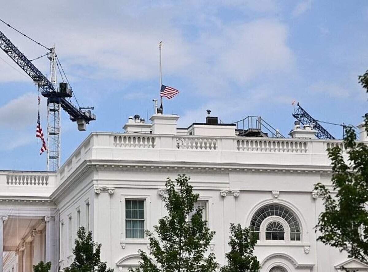 The flag above the White House flies at half-staff following the death of US Senator Lyndsey Graham, Republican of South Carolina, in Washington, DC, on July 12, 2026. Graham, an influential ally of President Donald Trump and advocate of hawkish US foreign policy, has died unexpectedly aged 71, his office said on July 12, 2026. Graham was a staunch supporter of the Iran war, and in recent years urged both the Trump and Biden administrations to back Kyiv's fight against Russia's invasion. He bitterly opposed Trump a decade ago, but came around to support him. (Photo by Mandel NGAN / AFP via Getty Images)