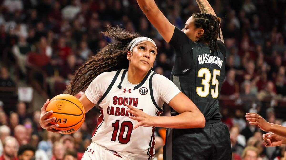 South Carolina Gamecocks center Kamilla Cardoso (10) drives around Vanderbilt Commodores forward Sacha Washington (35) in the first half at Colonial Life Arena.