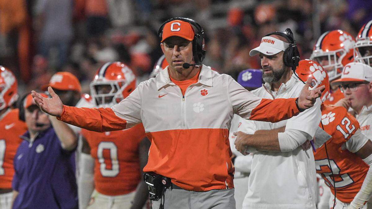 Clemson Tigers head coach Dabo Swinney reacts during the fourth quarter against the Louisville Cardinals at Memorial Stadium.