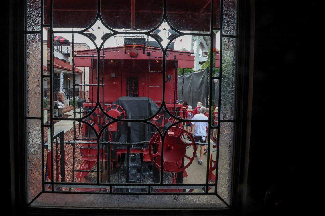 A line of 22 vintage railroad cabooses form the Cockaboose Railroad near the Williams-Brice Stadium. The Cockabooses are privately owned and used mainly for tailgating. This one has stained-glass windows.