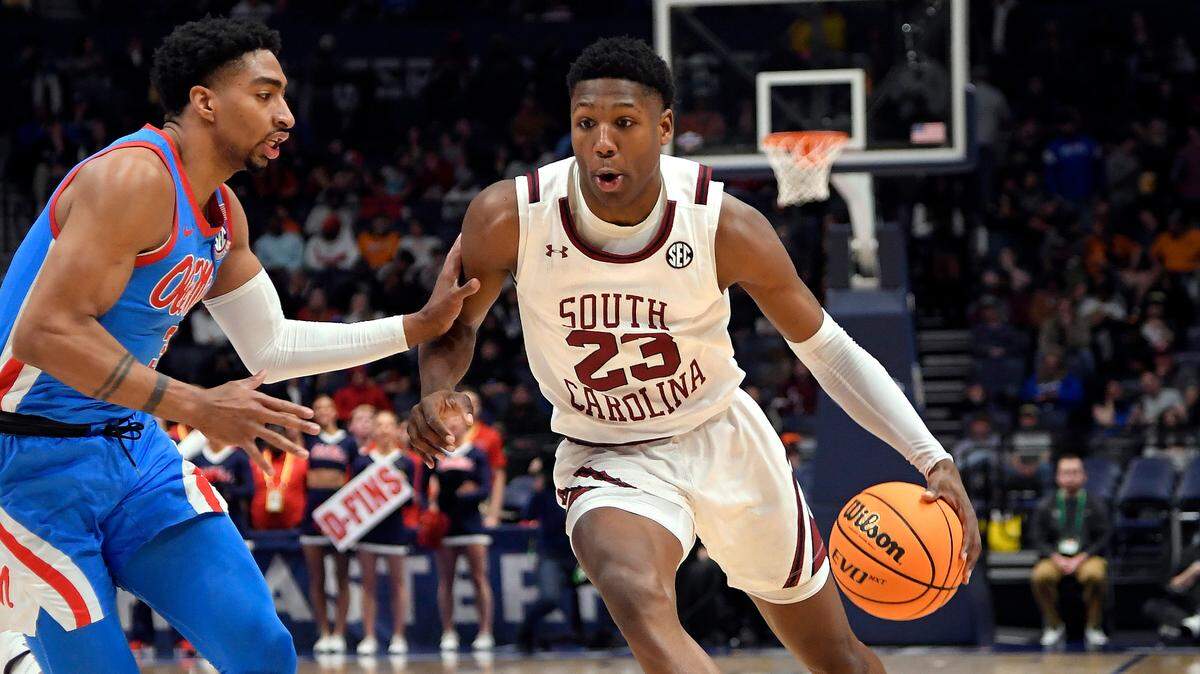 South Carolina Gamecocks forward Gregory Jackson II (23) drives past Mississippi Rebels forward Myles Burns (3) during the second half at Bridgestone Arena.