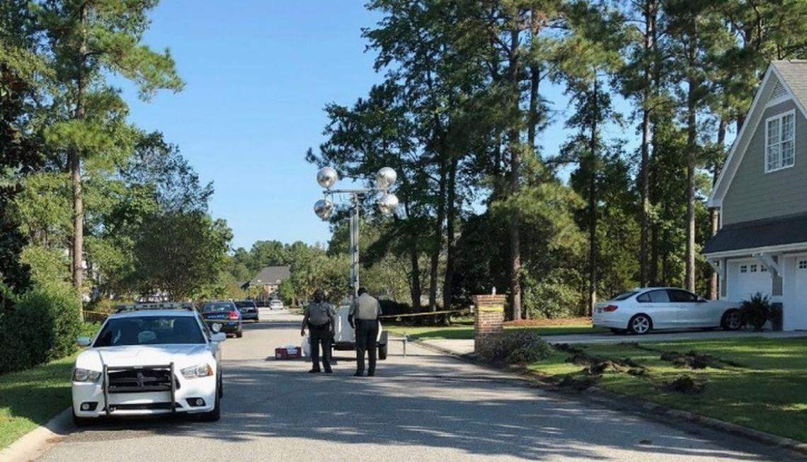 Police patrol the area of a fatal shooting in Florence, S.C., Thursday, Oct. 4, 2018
