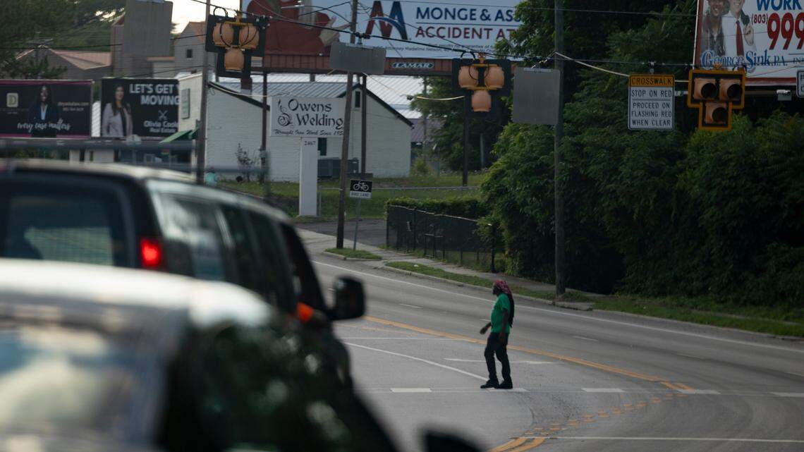 Pedestrians cross Millwood Avenue on Tuesday, June 11, 2024.