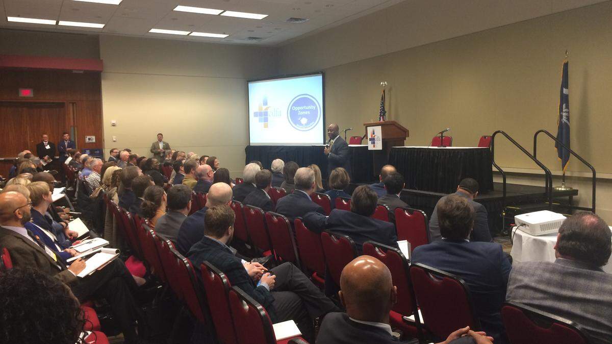 U.S. Sen. Tim Scott, R-North Charleston, addresses a gathering of S.C. investors, developers, business and civic leaders in Columbia during a summit about new federal legislation aimed at helping revitalizing poor communities across the U.S.