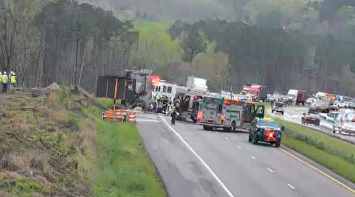 All westbound lanes on an interstate were blocked by a vehicle on fire.