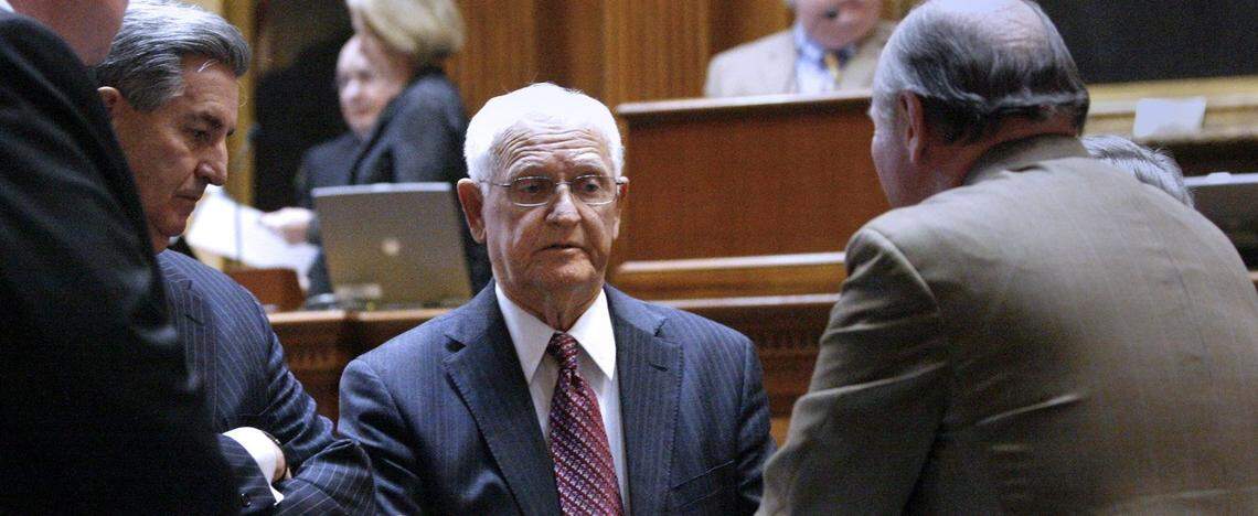 State Sen. Dick Elliott, center, pushed to keep a whale that died on the beach in South Carolina as a museum display, rather than allowing N.C. State University to have it. The whale washed ashore at North Myrtle Beach in early March 1986, but its bones have never been put on display, as planned. Elliott championed keeping the whale bones while he was a member of the state House of Representatives.