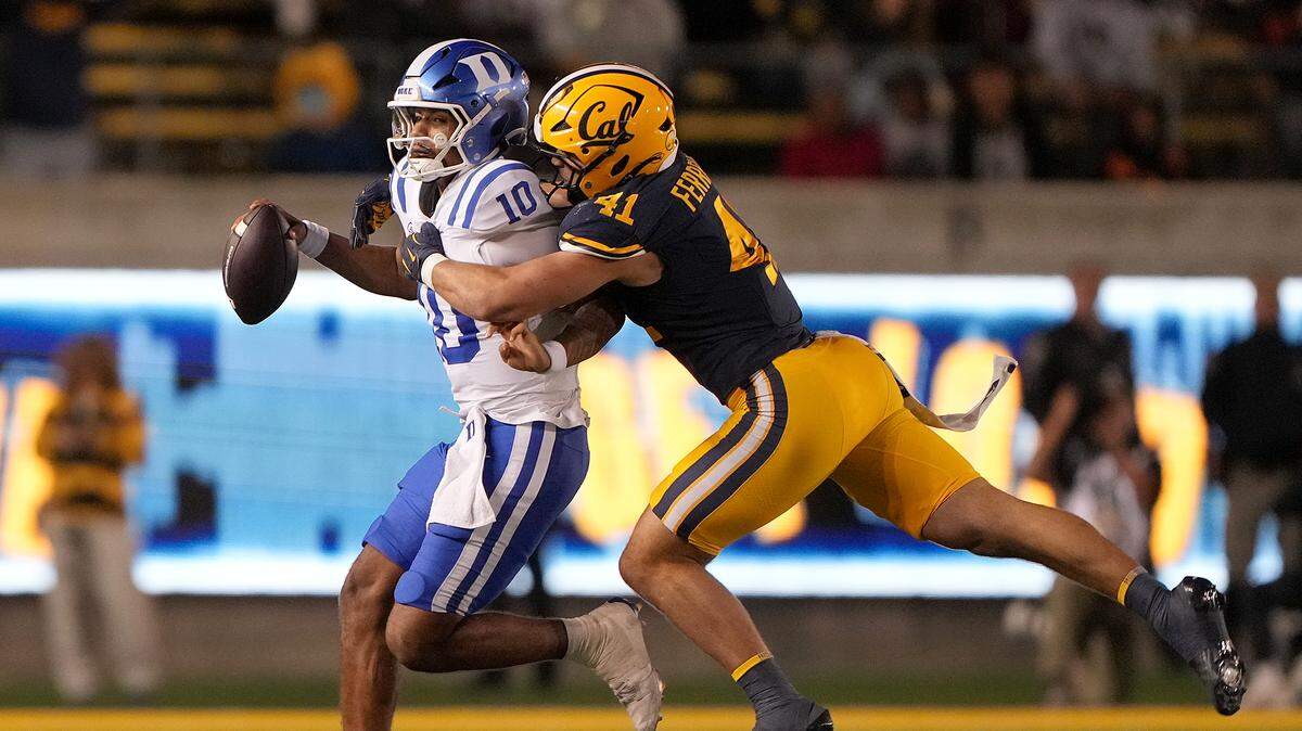 Luke Ferrelli #41 of the California Golden Bears sacks quarterback Darian Mensah #10 of the Duke Blue Devils on October 04, 2025 in Berkeley, California.