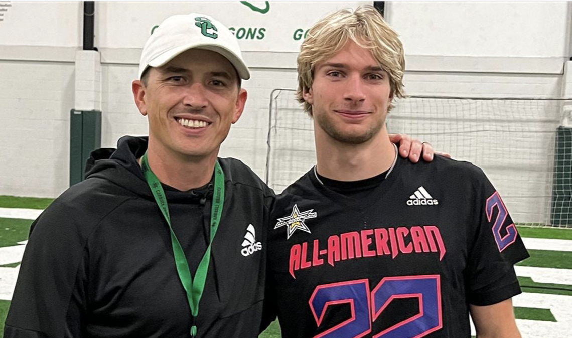 Southlake Carroll head football coach Riley Dodge (left) first saw South Carolina signee Landon Samson (right) in a video of a middle school track meet. Samson later starred for the Dragons as a wide receiver.