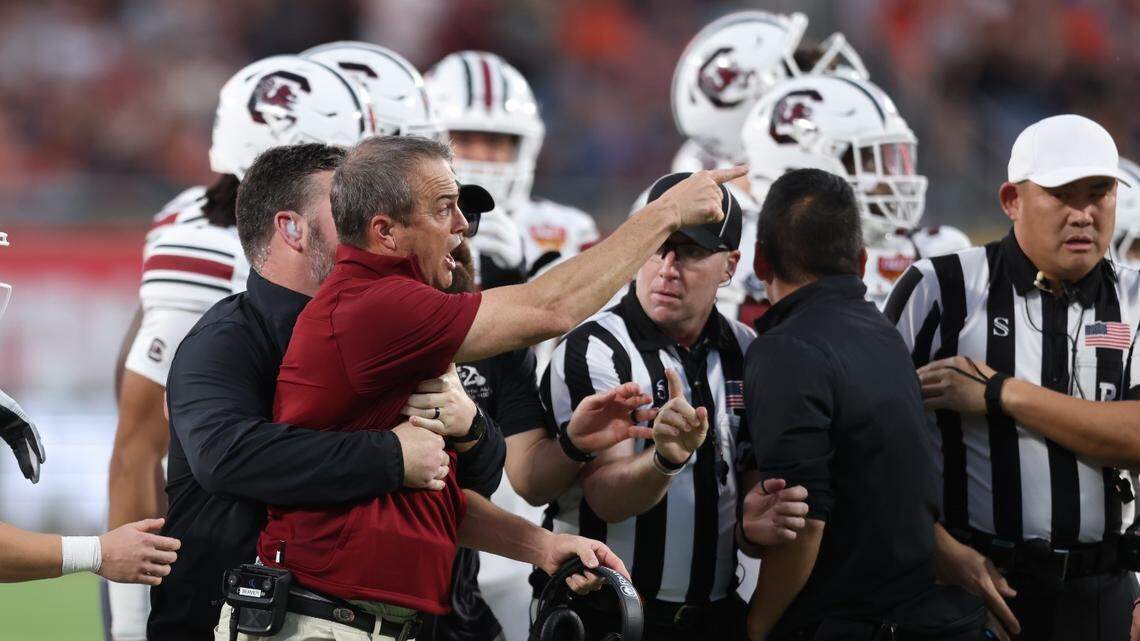 Shane Beamer reacts in the third quarter of the Citrus Bowl after being taunted by Bret Beliema.