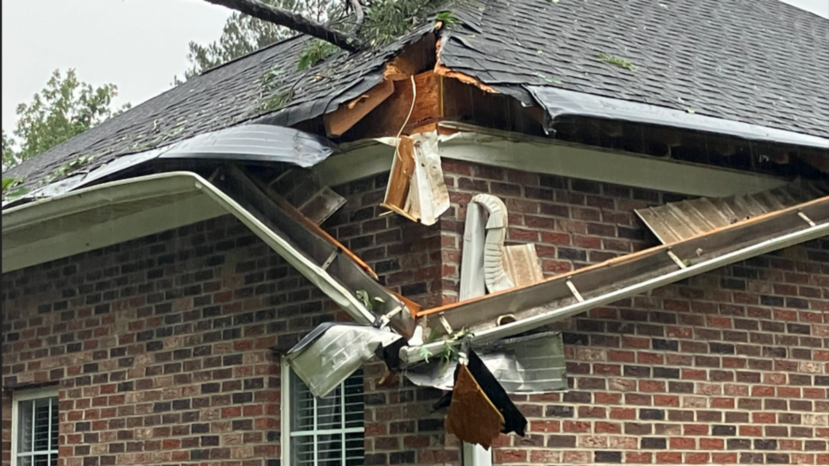 The damage to Linda Shanabrook’s home after a tree feel on the back of her house in the Night Harbor neighborhood near Lake Murray.