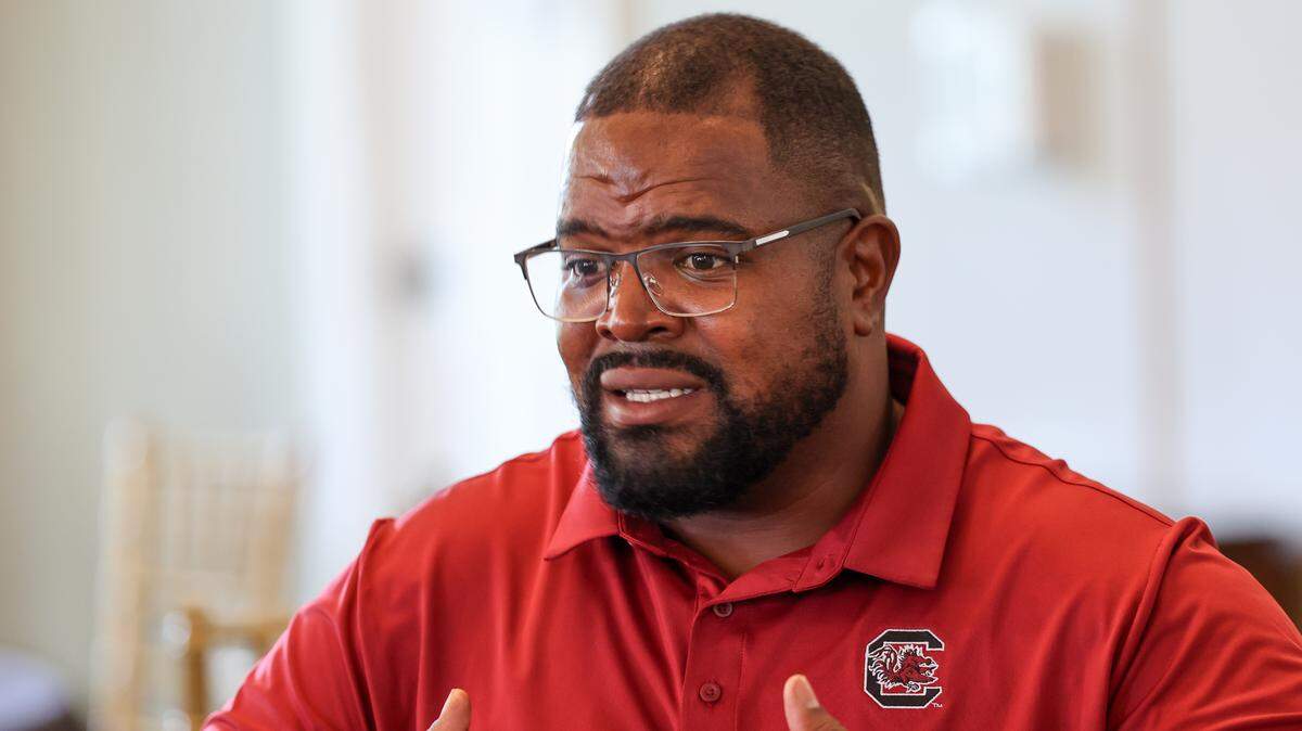 Defensive line coach Travian Robertson speaks to the media during the Birdies with Beamer event at Cobblestone Club on Monday, July 28, 2025.