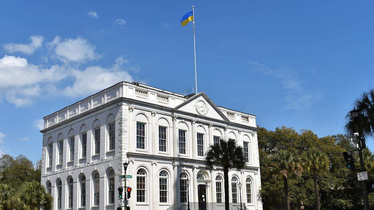 The Ukrainian flag fluttered above Charleston City Hall on Friday, Feb. 25, 2022. Charleston Mayor John Tecklenburg said the symbolic gesture is a show of solidarity with the Eastern European democracy that is now facing an invasion from neighboring Russia.
