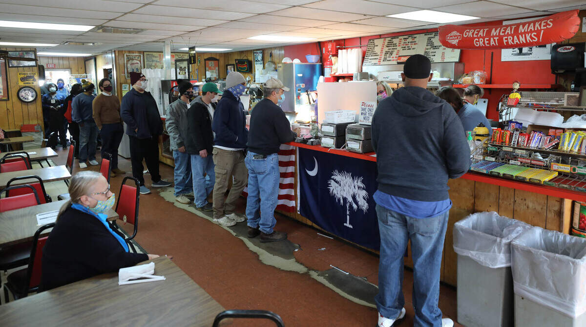 Mack’s Cash Grocery reopened after a 9-month hiatus due to the coronavirus. The burger joint known simply as Mack’s has had a continuous line of customers who have missed their burgers and hotdogs.