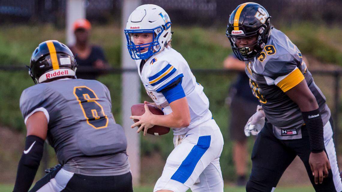 Lexington Wildcats quarterback Cal Herndon scrambles Friday during the game between Lexington High School and Irmo High School at Irmo High School.