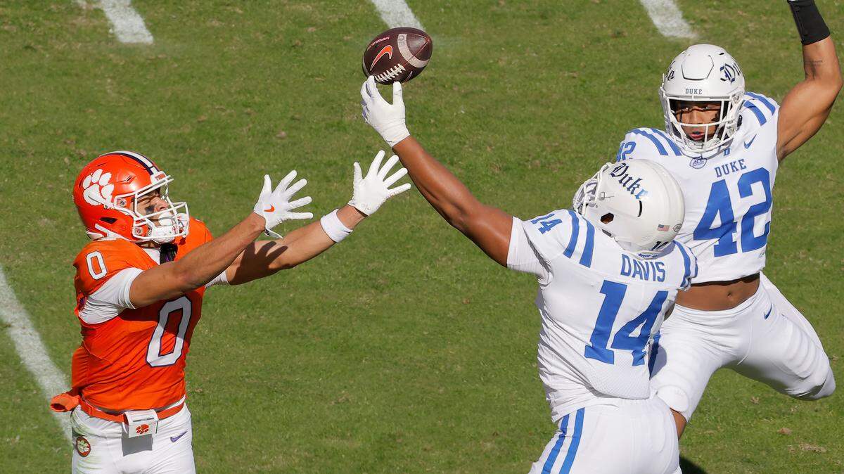 Duke defensive end Bryce Davis (14) breaks up a pass intended for Clemson wide receiver Antonio Williams (0) during first-half action in Clemson, S.C. on Saturday, Nov. 1, 2025. 
