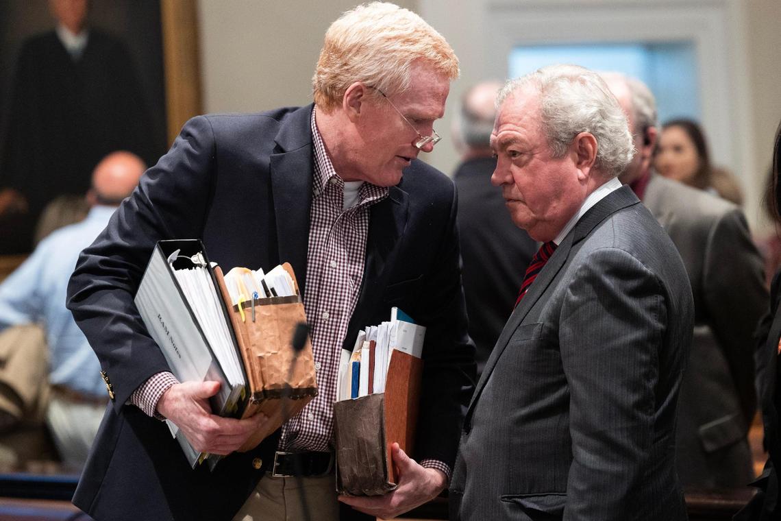 Alex Murdaugh speaks with his attorney Dick Harpootlian as hi trial for murder at the Colleton County Courthouse breaks for the day on Wednesday, February 8, 2023. Joshua Boucher/The State/Pool