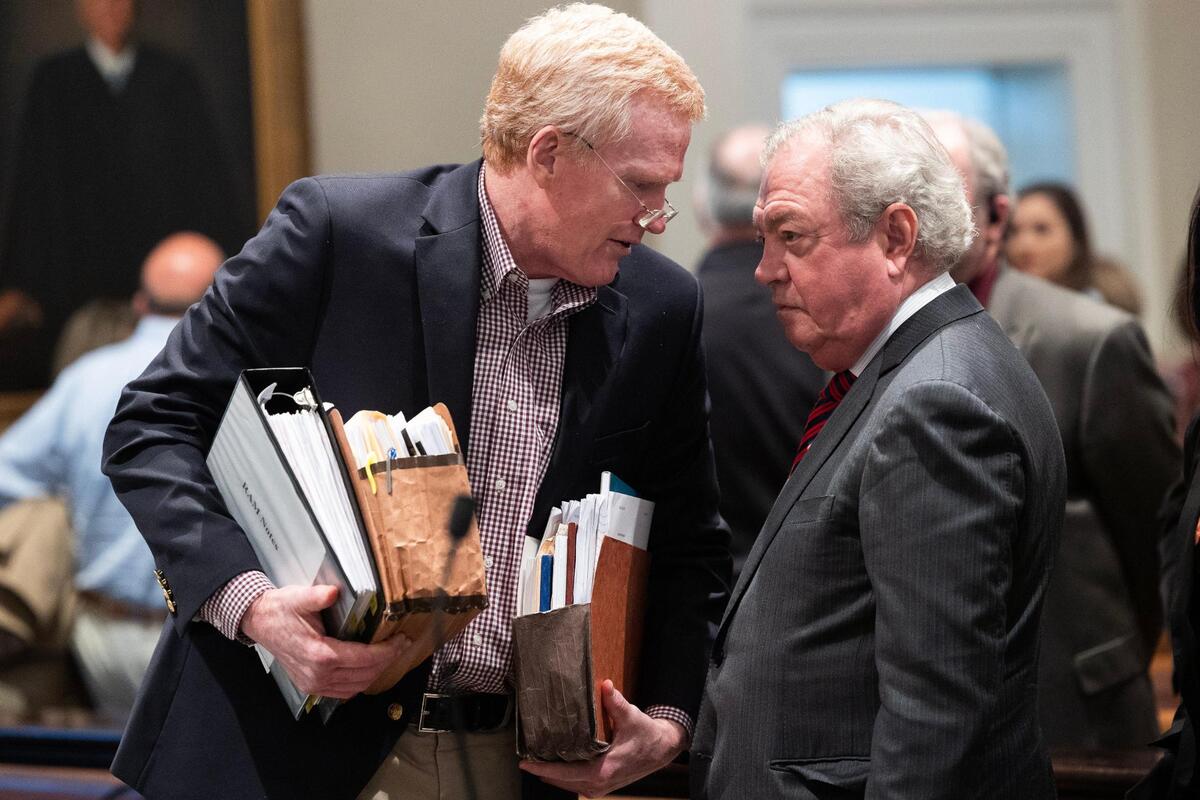 Alex Murdaugh speaks with his attorney Dick Harpootlian as hi trial for murder at the Colleton County Courthouse breaks for the day on Wednesday, February 8, 2023. Joshua Boucher/The State/Pool