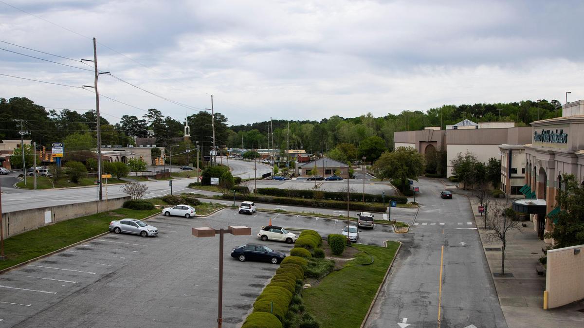 A few cars are parked outside the Richland Mall on Monday, March 30, 2020.