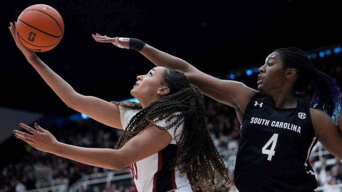 Stanford guard Haley Jones, left, shoots while defended by South Carolina forward Aliyah Boston (4) during the second half of an NCAA college basketball game in Stanford, Calif., Sunday, Nov. 20, 2022. (AP Photo/Godofredo A. Vásquez)