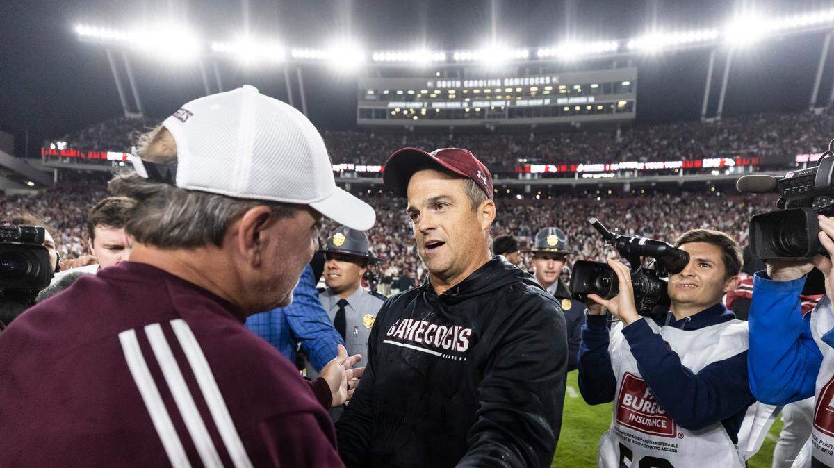 South Carolina Gamecocks head coach Shane Beamer speaks with Texas A&M Aggies head coach Jimbo Fisher following the Gamecocks’ win at Williams-Brice Stadium in Columbia, SC on Saturday, Oct. 22, 2022.