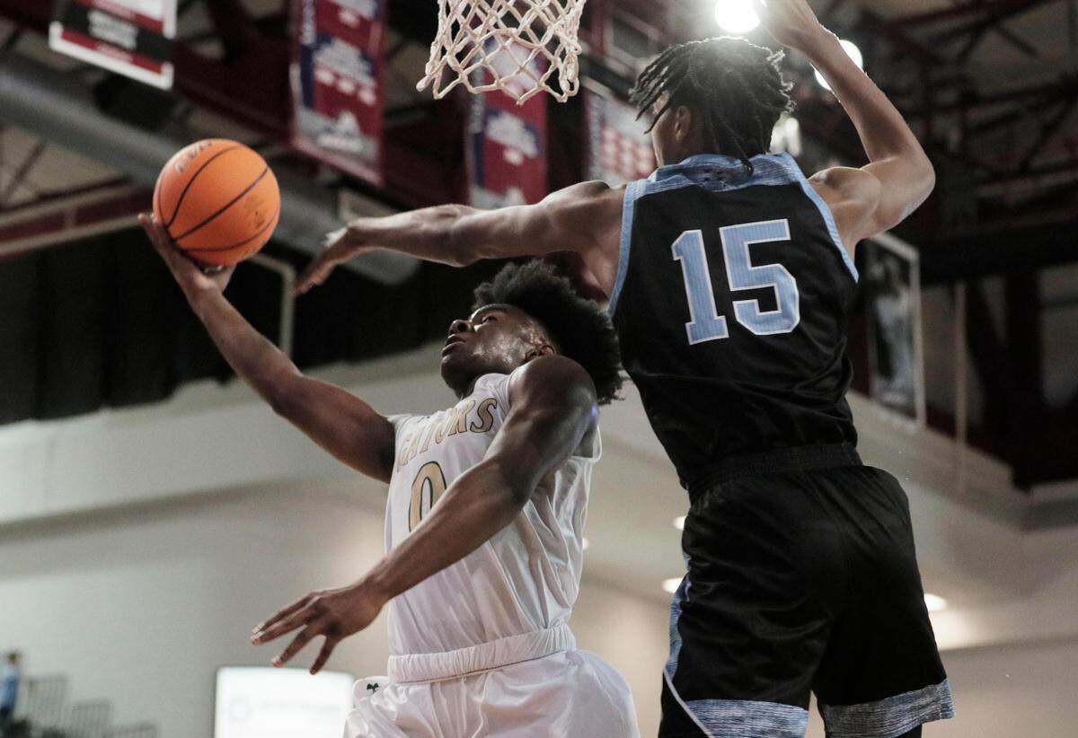 Dorman’s Noah Clowney blocks River Bluff’s Myles Jenkins in Aiken, South Carolina on Saturday, March 6, 2021.