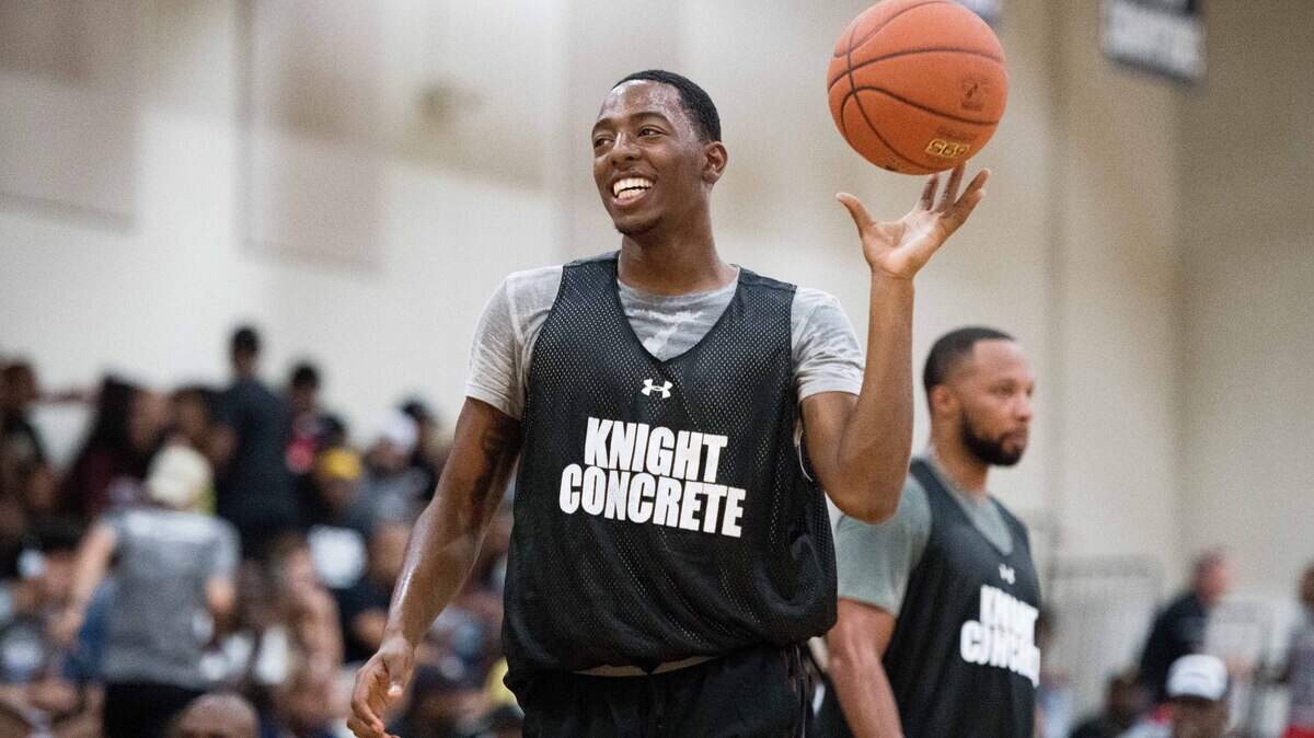 TJ Moss shares a smile during the seventh annual South Carolina Pro-Am basketball tournament at Heathwood High School on July 22, 2018, in Columbia, S.C.