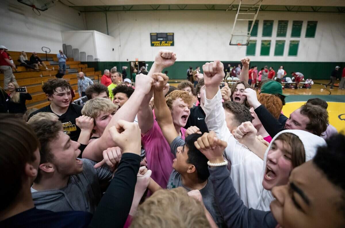 Members of the Ben Lippen wrestling team celebrate their win over the Hammond School in the SCISA 2022 Duals State Wrestling Tournament at Ben Lippen on Saturday, February 5, 2022.