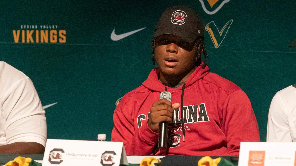 DeQuandre “DQ” Smith, a Spring Valley High School student, addresses the crowd during the Vikings’ signing day ceremony Wednesday.