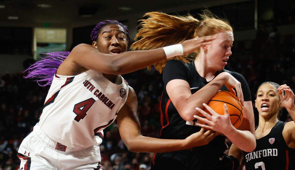 South Carolina’s Aliyah Boston (4) pressures Stanford’s Ashten Prechtel (11) during the first half of action on Tuesday, Dec. 21, 2021 in the Colonial Life Arena.