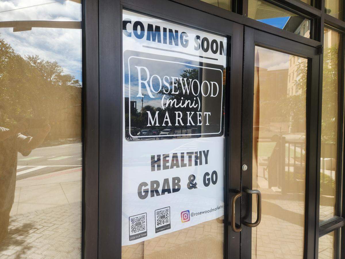 A sign at 601 Main St. in Columbia notes the Rosewood Mini Market is coming soon.