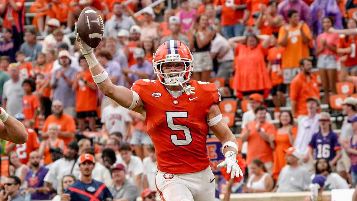 Clemson defensive back Ronan Hanafin (5) intercepts a ball against Troy during the third quarter at Memorial Stadium in Clemson, S.C. Saturday, September 6, 2025.
