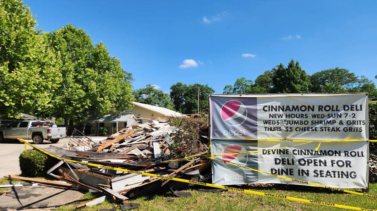 The Devine Cinnamon Roll Deli, located at 2617 Devine St. in the tan building to the back left in this photo, has torn down a neighboring house at 2621 Devine St. to make way for additional parking for the deli.
