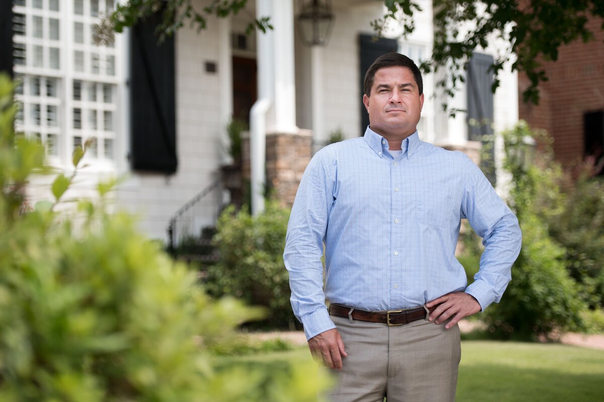 Rawlings LaMotte poses for a portrait in front of his home in the Gregg Park neighborhood on July 26, 2018, in Columbia, S.C. Rawlings and his neighbors are seeking to redraw school district lines so the community is in Richland 1 and not Richland 2.