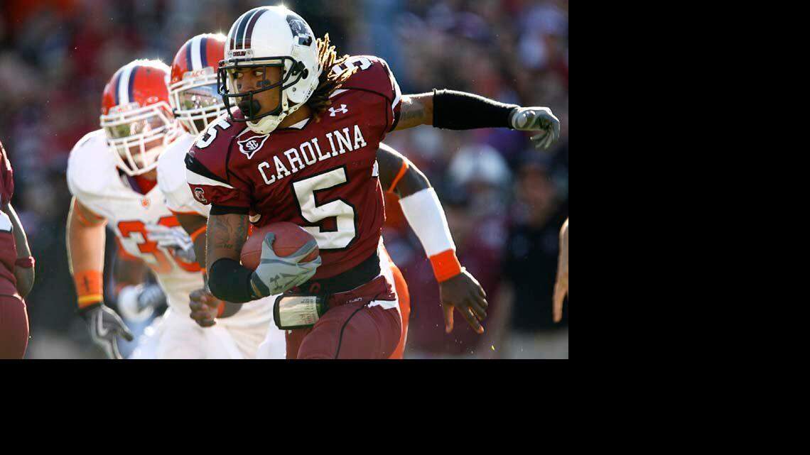 Carolina freshman cornerback No. 5 Stephon Gilmore runs on a punt return during the third quarter as USC defeats Clemson 34-17 at Williams-Brice Stadium on Saturday