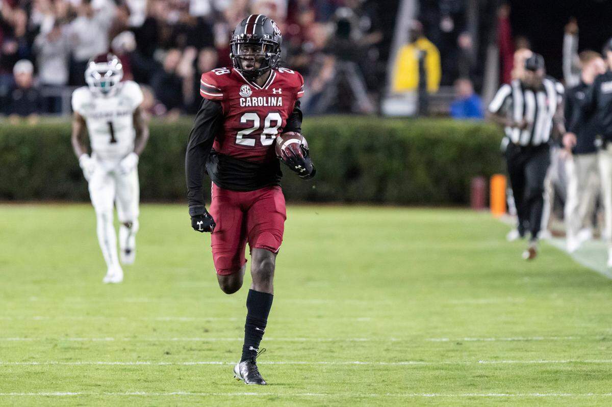 South Carolina Gamecocks defensive back Darius Rush (28) carries an interception against Texas A&M at Williams-Brice Stadium in Columbia, SC on Saturday, Oct. 22, 2022.
