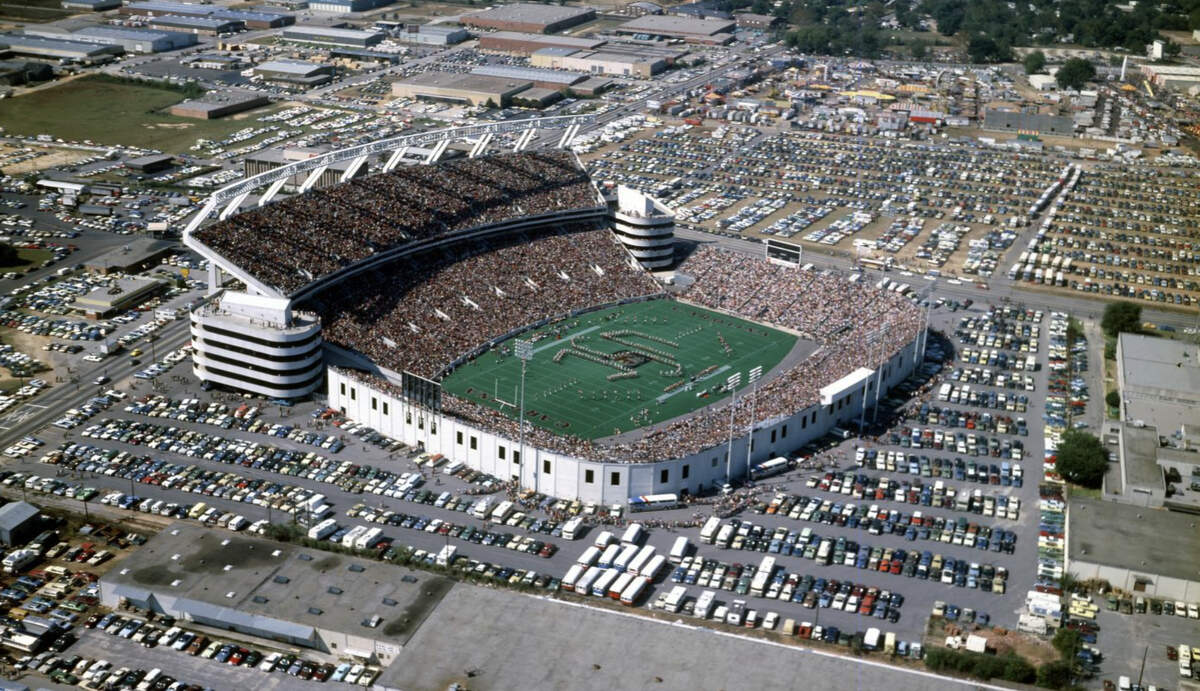 This photograph of the stadium from 1976 shows the new west addition and the original cinder-block walls.