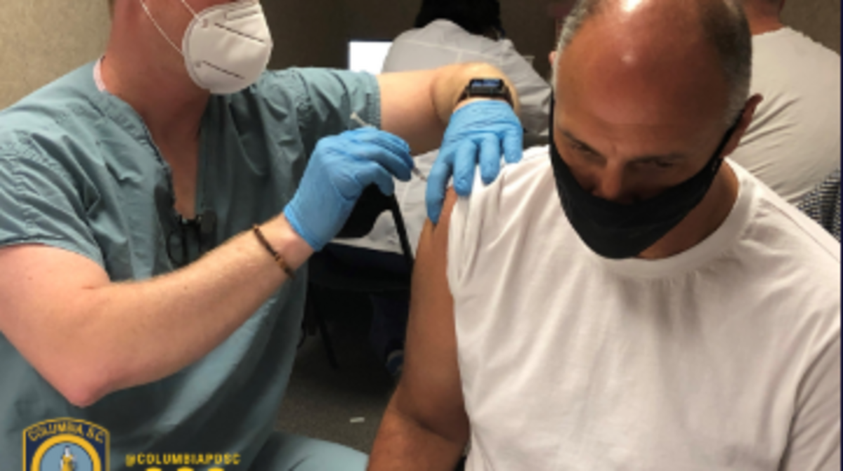 Columbia Police Chief Skip Holbrook gets a COVID-19 vaccine shot from Prisma Health on Tuesday, Jan. 12, 2021.
