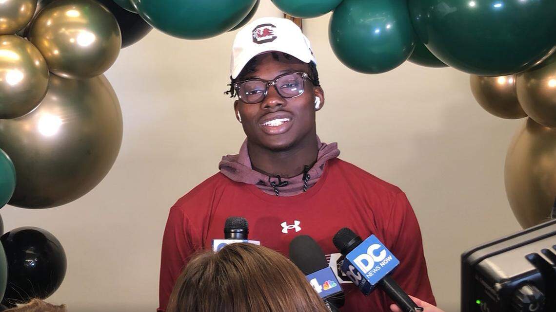 Nyckoles Harbor speaks with reporters after signing with South Carolina on Wednesday.