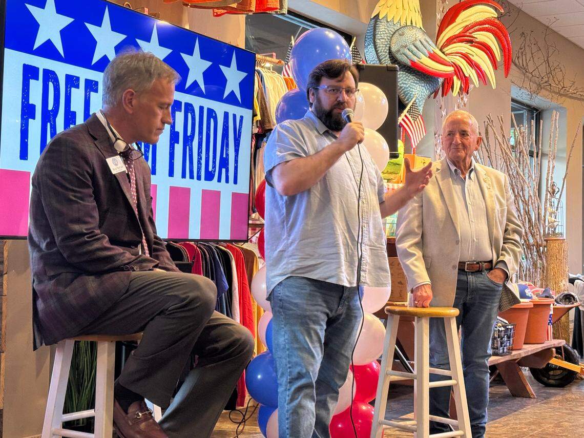 State Rep. Thomas Beach, R-Anderson, (center) speaks the Freedom Friday event at Momma Rabbit’s Nibbles and Sips in Lexington, S.C., on Friday, June 20, 2025. State Reps. Ryan McCabe, R-Lexington, and Joe White, R-Newberry, listen along.