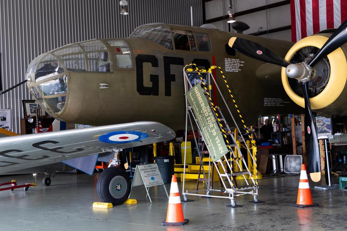 A restored B-25c at Owens Field Airport on Monday, August 7, 2023. This training place was retrieved from Lake Greenwood after being submerged for 39 years.