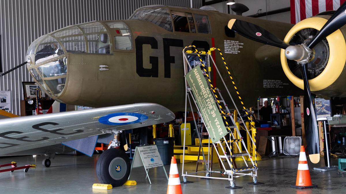 A restored B-25c at Owens Field Airport on Monday, August 7, 2023. This training place was retrieved from Lake Greenwood after being submerged for 39 years.