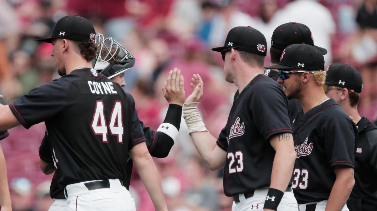 South Carolina players congratulate one another after scoring a run against Ole Miss at Founders Park on Saturday, April 16, 2022.