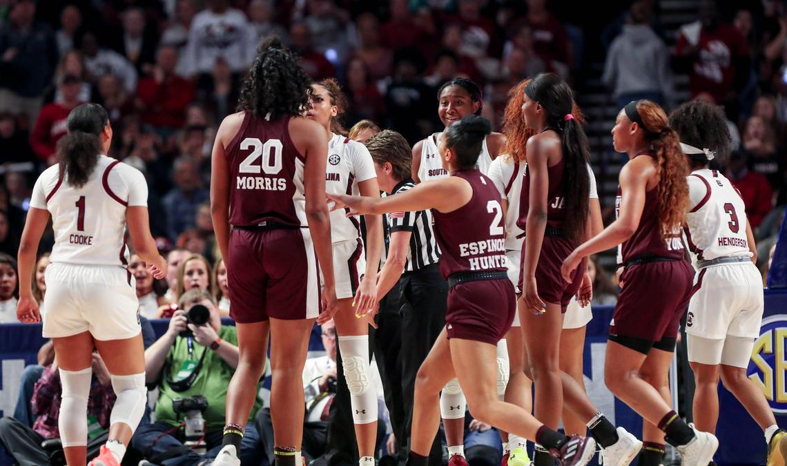South Carolina’s Mikiah Herbert Harrigan (21) and Mississippi State’s Yemiyah Morris (20) face off after a call during the first half of action in the SEC Championship game at the Bon Secours Wellness Arena in Greenville, S.C. 3/8/20