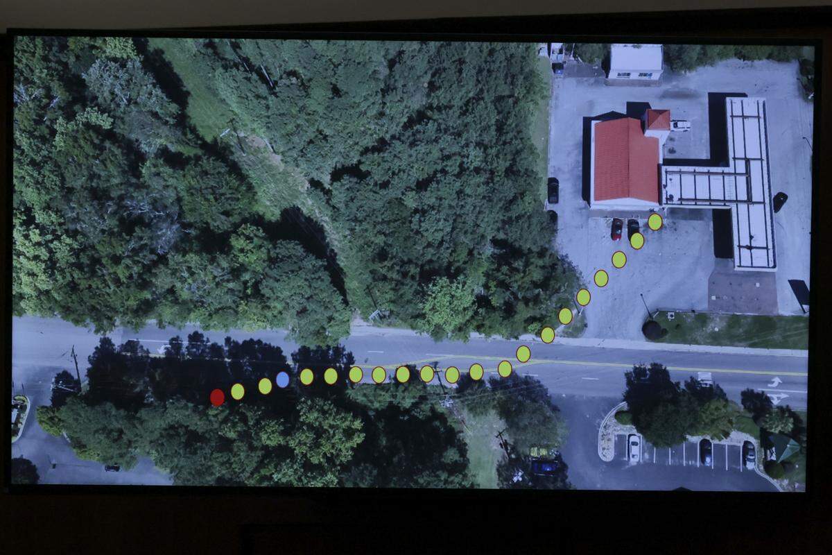 The path taken by Cyrus Carmack-Belton running from Rick Chow’s convenience store to where he was shot, is shown in an image show in court during the trial of Rick Chow on Monday, June 1, 2026. 